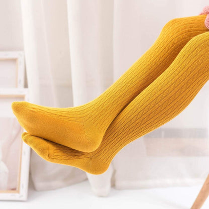 Present your little girls with a three-pack of cozy knit tights. Ages 8–10, Comes in a variety of colors.