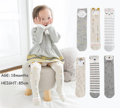 Cartoon animal print knee high socks made of soft cotton, perfect for girls and toddlers. Age range: 1–7 years.