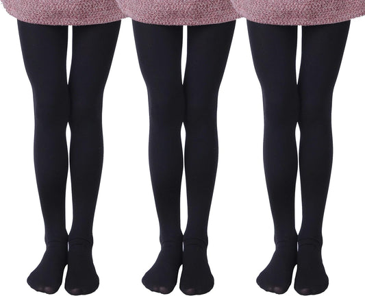 Three pairs of black microfiber tights for girls ages 6 to 8.