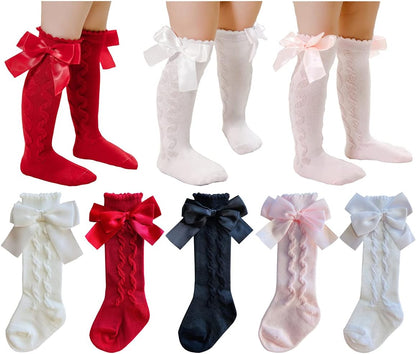 Knee-high socks for infant girls with a non-slip sole. Size: 0-12 months, Color: Cable Style.