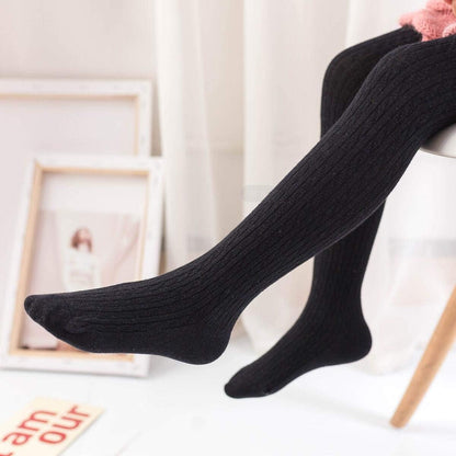 Present your little girls with a three-pack of cozy knit tights. Ages 8–10, Comes in a variety of colors.