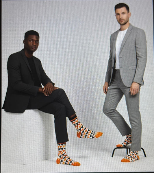 Teenage boys that are knee-high/crew socks, with fun patterns and designs. Sizes:9-13