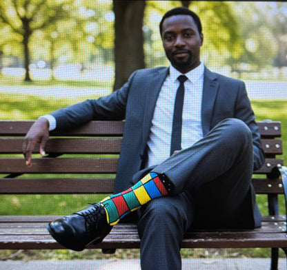 Teenage boys that are knee-high/crew socks, with fun patterns and designs. Sizes:9-13