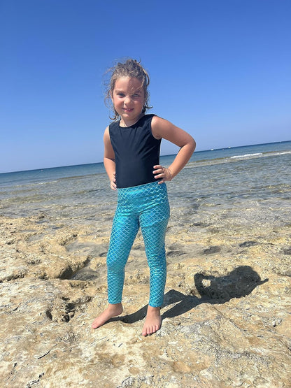 Girls' Mermaid Leggings Glamorous metallic accent that adds the ideal touch to your child's wardrobe.  Size Small, 5 to 6Y (Waist-8), and light blue/mermaid colors.    