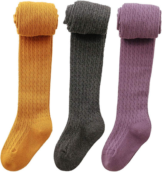 Adorn your little girl with these cozy knitted tights—a three-pack!  Ages 4-6, Variety of Colors.