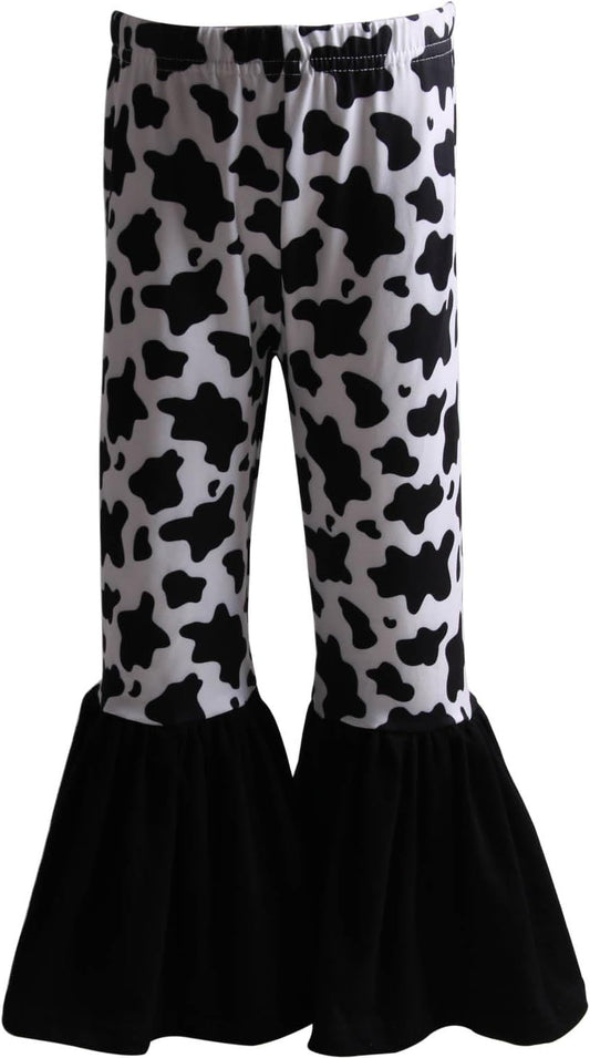 Black and white ruffle leggings with a cow animal pattern and a print for girls aged 12 to 18 months (height30.5-32"; weight 26-28lbs; waist 19.5-20.25")..