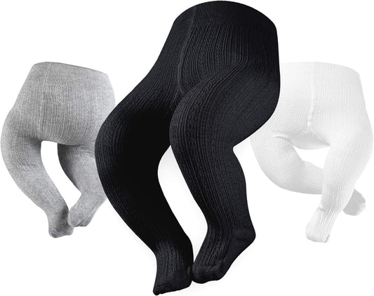 Full-footed seamless cable knit tights for infants. Size: 3-6 months; Black, Ivory, Grey.