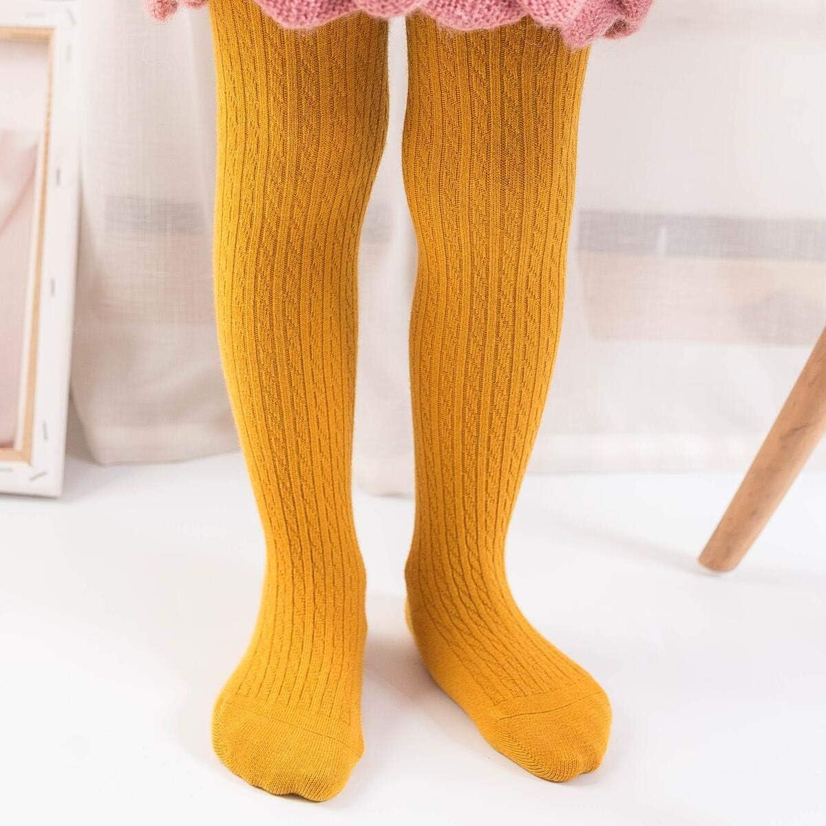 Adorn your little girl with these cozy knitted tights—a three-pack!  Ages 4-6, Variety of Colors.